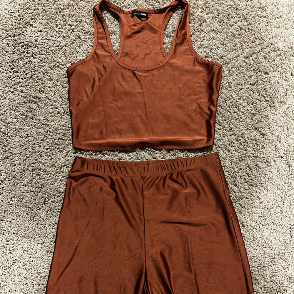 Copper colored shiny short set size Large